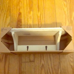 Small wood shelf with two hooks
